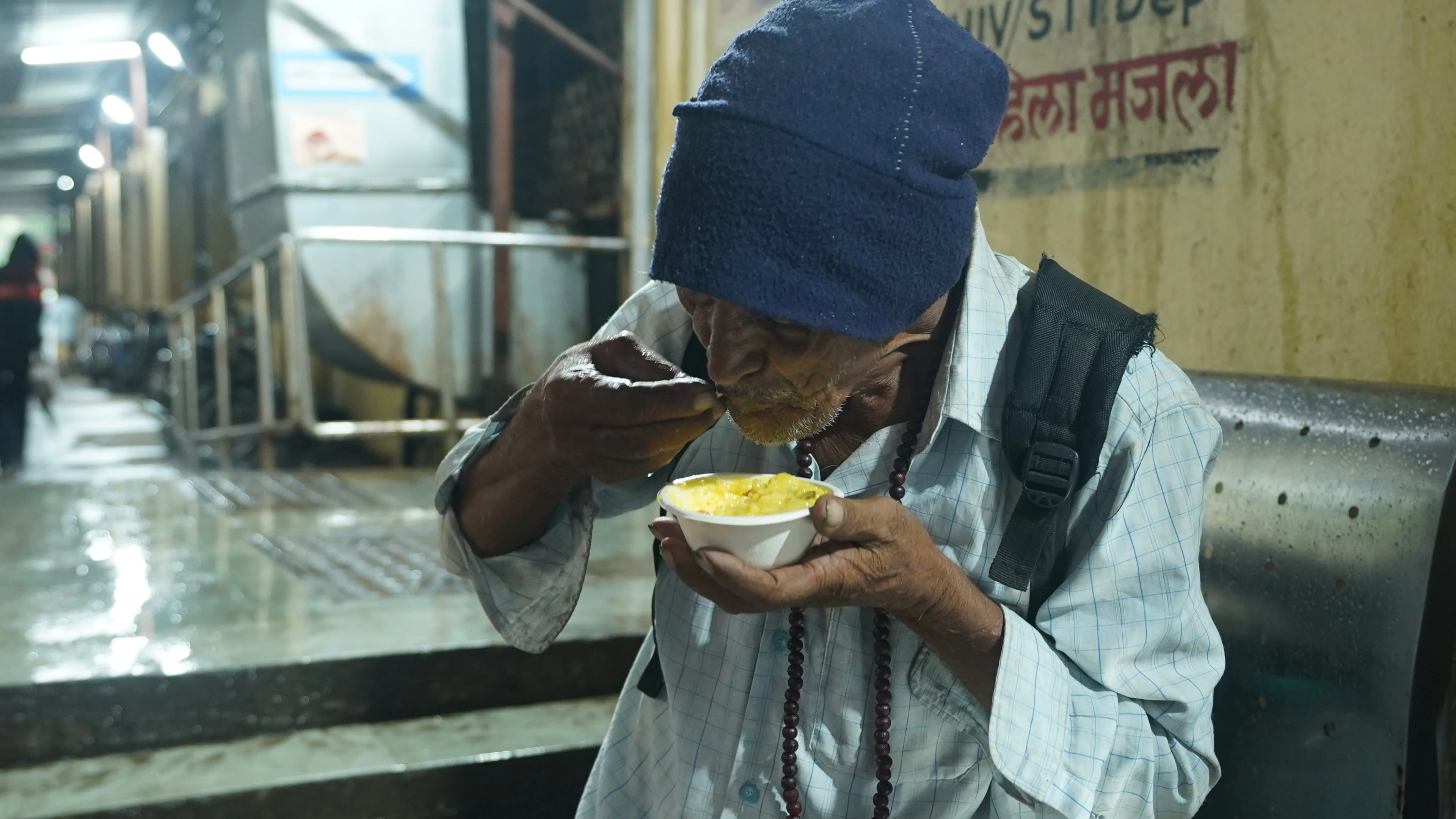 Volunteers sharing food at Annam Brahma