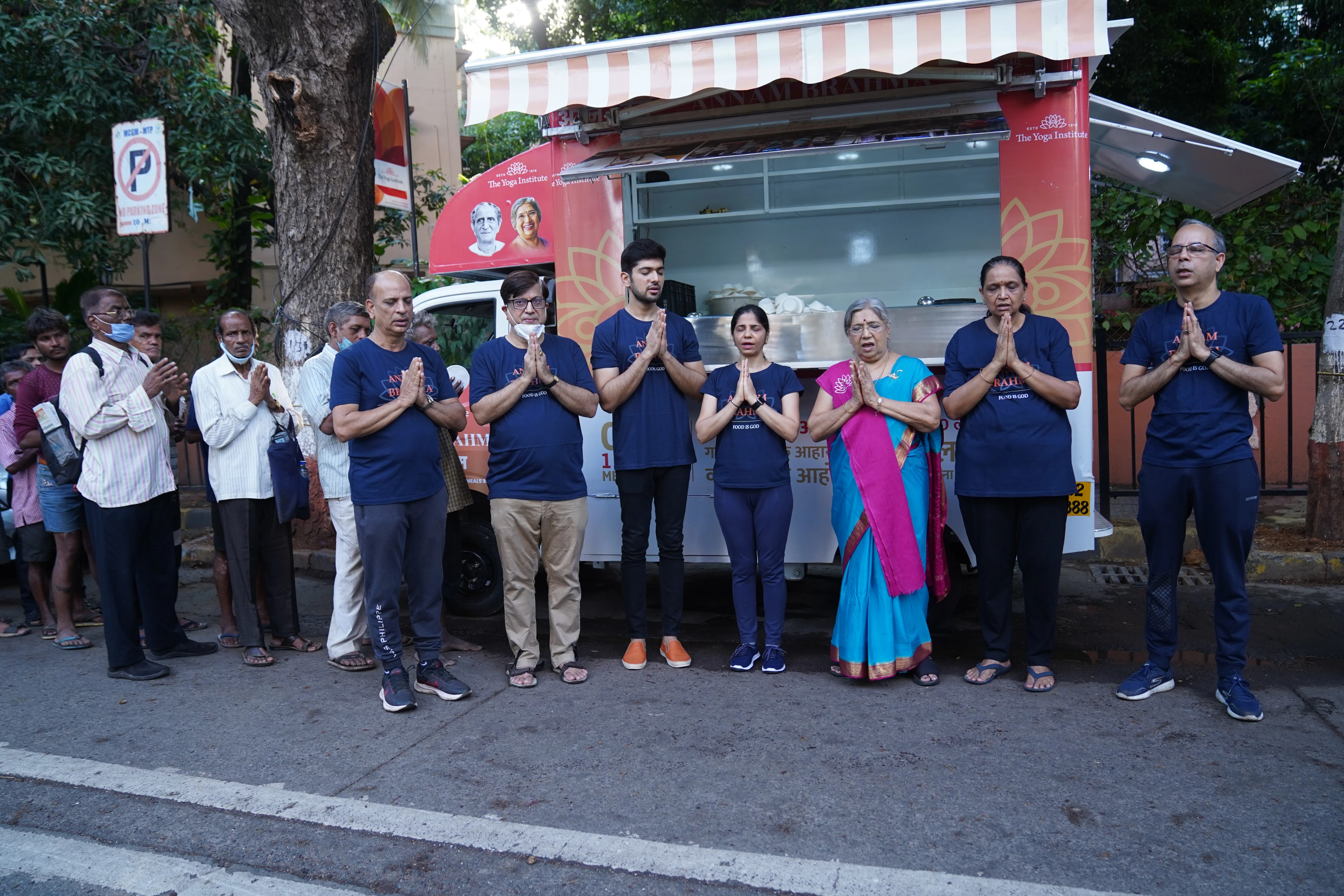 Community members waiting to receive food