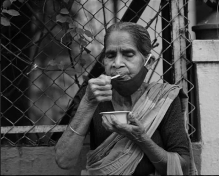 Elderly woman with scarf